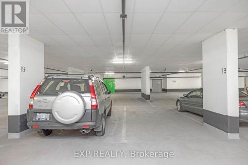 1202 - 65 Yorkland Boulevard N, Brampton, ON - Indoor Photo Showing Garage