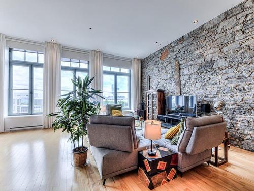 Salon - 309-64 Rue St-Paul O., Montréal (Ville-Marie), QC - Indoor Photo Showing Living Room With Fireplace