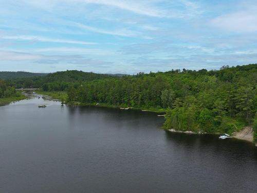 Overall view - 135 Ch. Blackburn, Val-Des-Monts, QC - Outdoor With Body Of Water With View