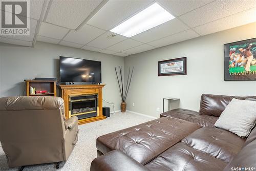 231 Hogg Way, Saskatoon, SK - Indoor Photo Showing Other Room With Fireplace