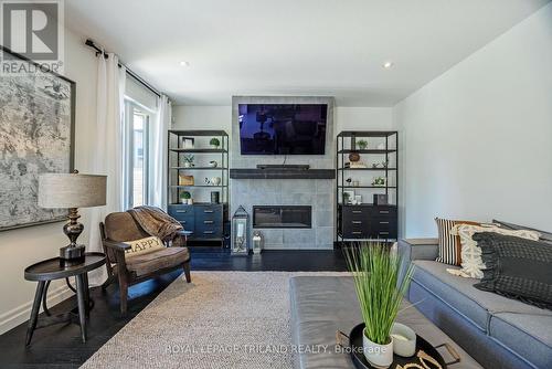 1016 Riverbend Road, London, ON - Indoor Photo Showing Living Room With Fireplace