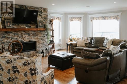 26 Main Street, New Wes Valley, NL - Indoor Photo Showing Living Room With Fireplace