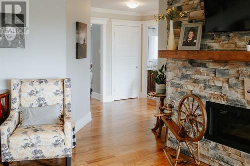 26 Main Street, New Wes Valley, NL - Indoor Photo Showing Living Room With Fireplace