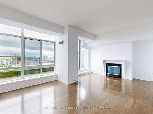 Ph1-39 Parliament St, Toronto, ON - Indoor Photo Showing Living Room With Fireplace