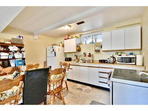 27 Sandy Lane E, Essa, ON - Indoor Photo Showing Kitchen With Double Sink