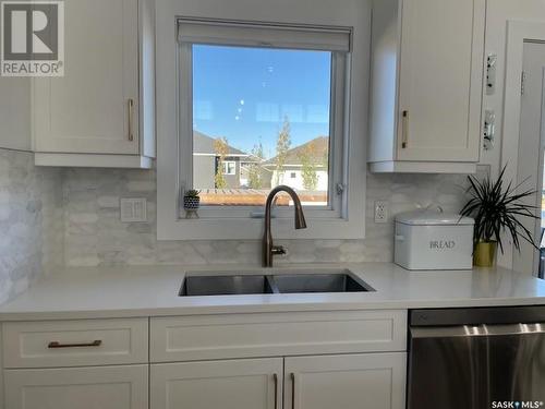 519 Mickelson Lane, Warman, SK - Indoor Photo Showing Kitchen With Double Sink