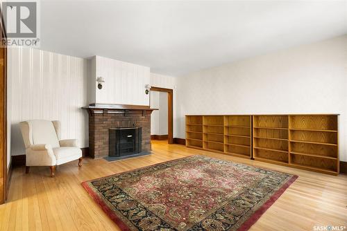 170 Angus Crescent, Regina, SK - Indoor Photo Showing Living Room With Fireplace