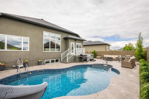 23 Fetterly Way, Headingley, MB - Outdoor With In Ground Pool With Backyard