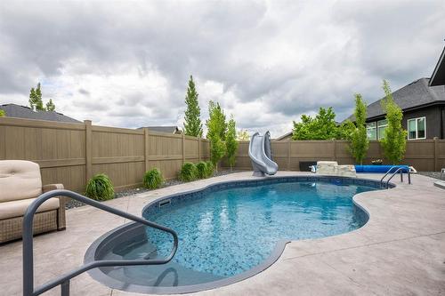 23 Fetterly Way, Headingley, MB - Outdoor With In Ground Pool With Backyard