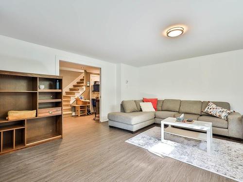 Family room - 349 Ch. Pierre-Laporte, L'Ange-Gardien, QC - Indoor Photo Showing Living Room