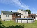 Face arriÃ¨re - 631 204E Rue, Shawinigan, QC  - Outdoor With Above Ground Pool With Exterior 