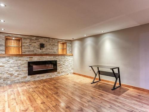 Living room - 631 204E Rue, Shawinigan, QC - Indoor Photo Showing Living Room With Fireplace