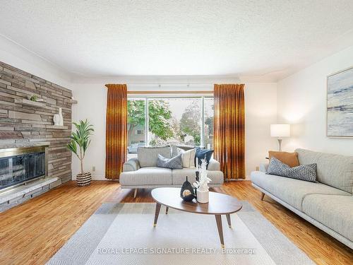 68 Albemarle St, Brantford, ON - Indoor Photo Showing Living Room With Fireplace