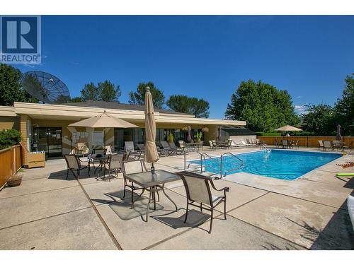 1255 Raymer Avenue Unit# 504, Kelowna, BC - Outdoor With In Ground Pool With Deck Patio Veranda