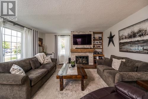 950 Burden Street, Prince George, BC - Indoor Photo Showing Living Room With Fireplace