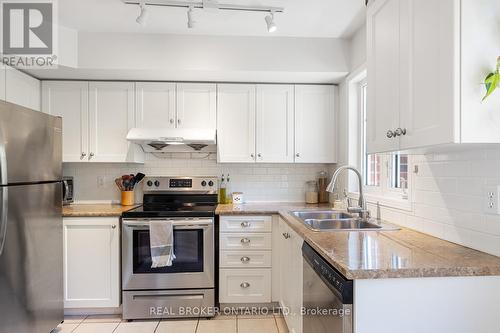 203 - 262 St Helens Avenue, Toronto, ON - Indoor Photo Showing Kitchen With Stainless Steel Kitchen With Double Sink
