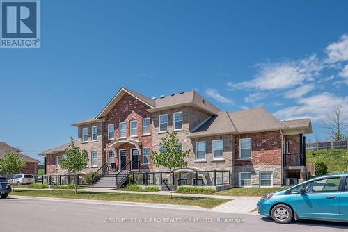 208 - 440 Lonsberry Drive, Cobourg, ON - Outdoor With Facade