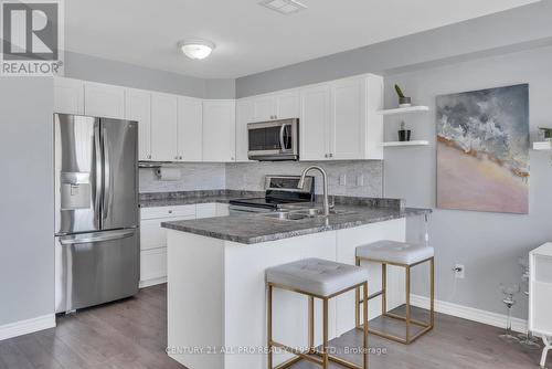 208 - 440 Lonsberry Drive, Cobourg, ON - Indoor Photo Showing Kitchen With Double Sink With Upgraded Kitchen