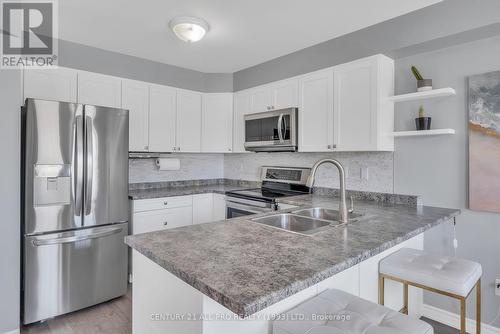 208 - 440 Lonsberry Drive, Cobourg, ON - Indoor Photo Showing Kitchen With Double Sink With Upgraded Kitchen