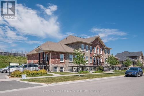 208 - 440 Lonsberry Drive, Cobourg, ON - Outdoor With Facade