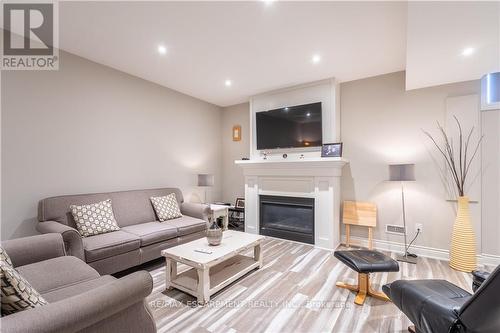 36 Kingspoint Circle, Hamilton, ON - Indoor Photo Showing Living Room With Fireplace