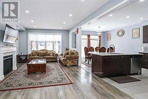 Bsmt - 7977 Hackberry Trail, Niagara Falls, ON - Indoor Photo Showing Living Room With Fireplace