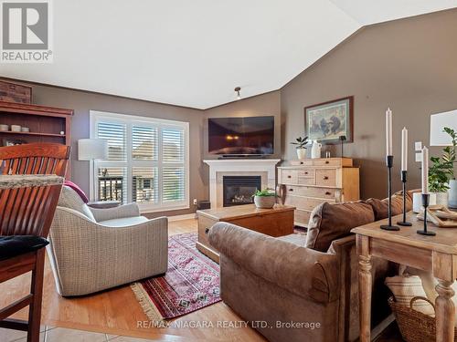 390 Jasmine Court, Fort Erie, ON - Indoor Photo Showing Living Room With Fireplace