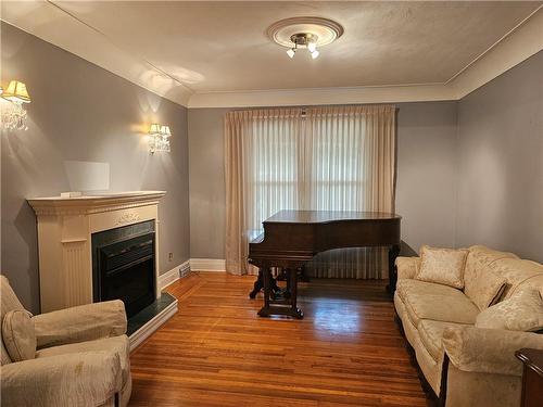 212 Balmoral Avenue S, Hamilton, ON - Indoor Photo Showing Living Room With Fireplace