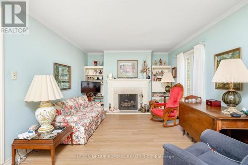 14 Mallingham Court, Toronto, ON - Indoor Photo Showing Living Room With Fireplace