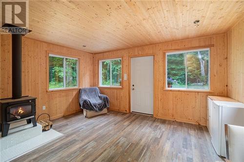 Interior of Cabin - 1786 Clarendon Road, Central Frontenac (Frontenac Centre), ON - Indoor With Fireplace