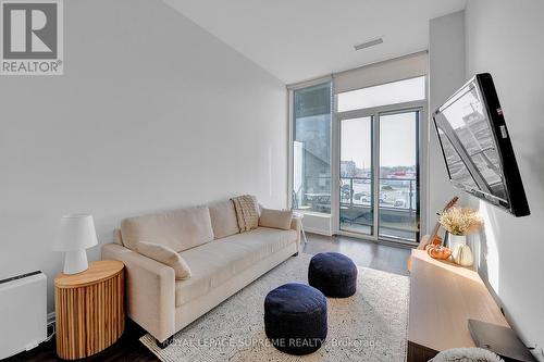 215 - 4208 Dundas Street W, Toronto, ON - Indoor Photo Showing Living Room