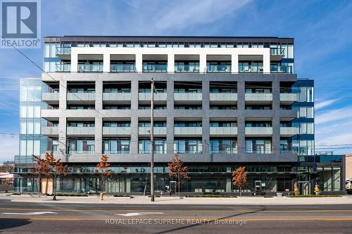 215 - 4208 Dundas Street W, Toronto, ON - Outdoor With Balcony With Facade