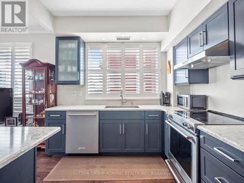 1210 - 2 Clairtrell Road, Toronto, ON - Indoor Photo Showing Kitchen With Upgraded Kitchen