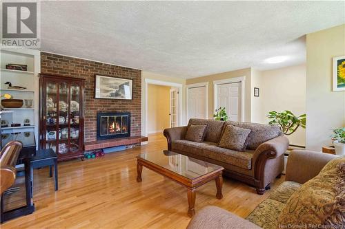 8 Durling Drive, Island View, NB - Indoor Photo Showing Living Room With Fireplace