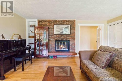 8 Durling Drive, Island View, NB - Indoor Photo Showing Living Room With Fireplace