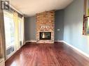 3610 Woodland, Windsor, ON  - Indoor Photo Showing Living Room With Fireplace 