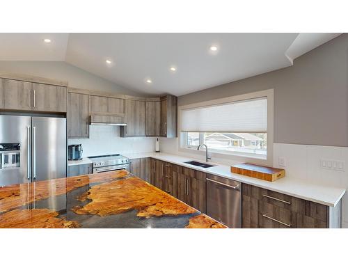 307 Legacy Lookout, Cranbrook, BC - Indoor Photo Showing Kitchen With Stainless Steel Kitchen With Double Sink