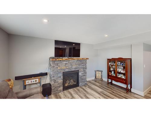 307 Legacy Lookout, Cranbrook, BC - Indoor Photo Showing Living Room With Fireplace