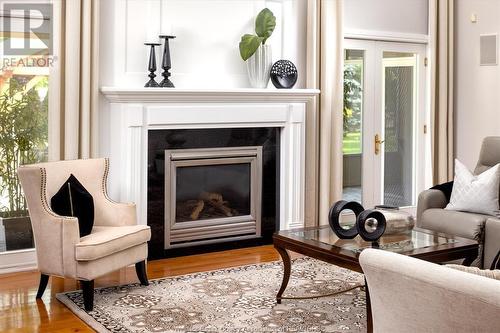 2160 Normandy Street, Lasalle, ON - Indoor Photo Showing Living Room With Fireplace