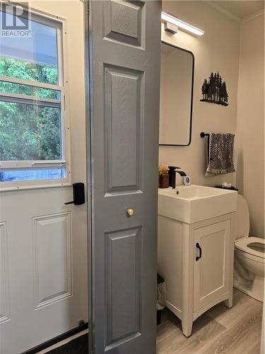 Powder room at back entrance - 60 Sebastopol Drive, Foymount, ON - Indoor Photo Showing Other Room