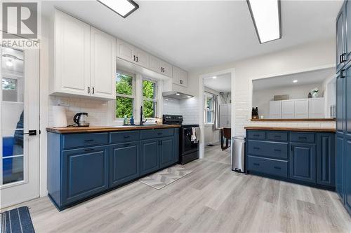 Painted cabinetry, new backsplash, new countertop - 60 Sebastopol Drive, Foymount, ON - Indoor Photo Showing Kitchen