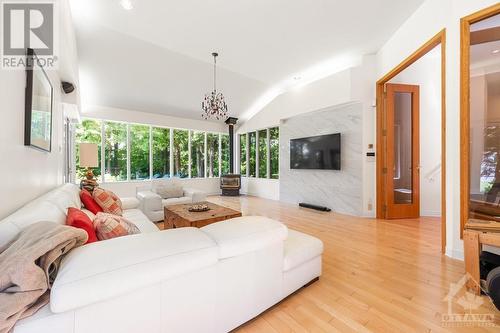 6 Ryan Court, Embrun, ON - Indoor Photo Showing Living Room With Fireplace