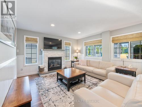 8 Temagami Trail, Wasaga Beach, ON - Indoor Photo Showing Living Room With Fireplace