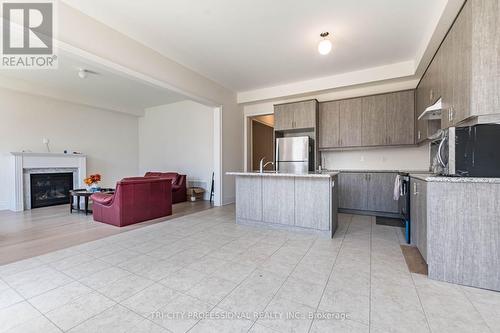 42 Phyllis Drive, Caledon, ON - Indoor Photo Showing Kitchen With Fireplace