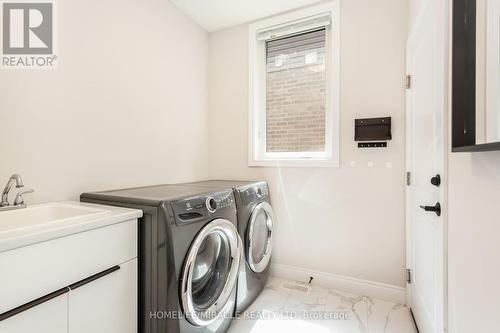 23 Tindall Crescent, East Luther Grand Valley, ON - Indoor Photo Showing Laundry Room