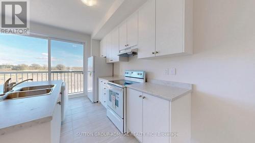 90 Sandhill Crane Drive, Wasaga Beach, ON - Indoor Photo Showing Kitchen