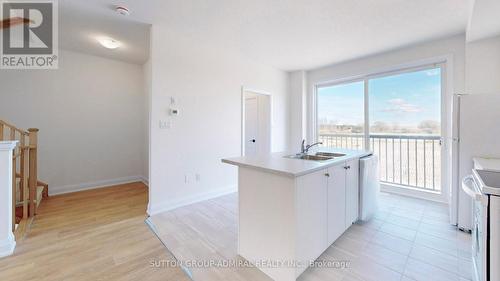 90 Sandhill Crane Drive, Wasaga Beach, ON - Indoor Photo Showing Kitchen With Double Sink