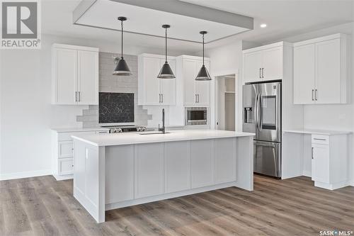 115 Woolf Bend, Saskatoon, SK - Indoor Photo Showing Kitchen With Upgraded Kitchen