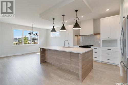 115 Woolf Bend, Saskatoon, SK - Indoor Photo Showing Kitchen With Upgraded Kitchen