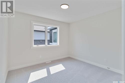 115 Woolf Bend, Saskatoon, SK - Indoor Photo Showing Other Room